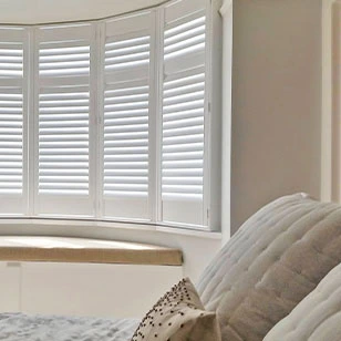 Tailor-made shutters that can fit any shape of window bay by using custom bay posts.